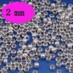 Intercalaires,perles à écraser argentées<br />
        2 mm<br />
Qte : 100