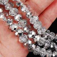 Perles 6 x 4mm, perles <br />
Cristal argentees<br />
X 25