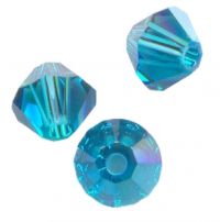 TOUPIES SWAROVSKI® ELEMENTS
 4 mm  
BLUE ZIRCON AB
X 50 perles  