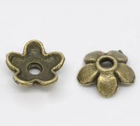 Coupelles Fleur 5 Pétales Bronze 6.5x6.5mm
taille du trou = 1.3 mm
X 10