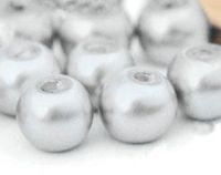 Perles nacrées  blanches rondes 
4mm
X 50
