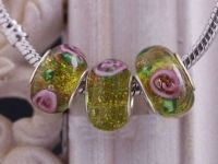 Perles Lampwork , perles de Murano et argent
   15 x 9 et trou 4.5.... fleur
X 10   Perles