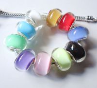 Perles Lampwork , perles de Murano et argent 925 silver
14 x 9 et trou 4.5 mm
X 10