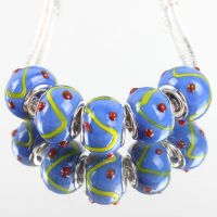  Perles Lampwork , perles de Murano et argent
14 x 9 et trou 4.5 mm 
X 5 