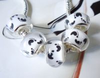Perles Lampwork , perles de Murano et argent 925 silver
14 x 9 et trou 4.5 mm
X 5