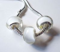 Perles Lampwork , perles de Murano et argent 925 silver
14 x 9 et trou 4.5 mm  
X 5