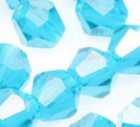  Toupies en cristal 4 mm
aquamarine
X 100