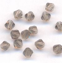 Toupies 4 mm
crystal de boheme
black diamond
X 100