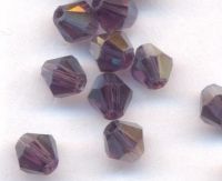  Toupies en crystal 4mm 
Violet fonce AB
X 100 