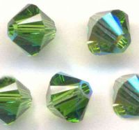 Toupies en crystal 4 mm
fern green AB
X 100 