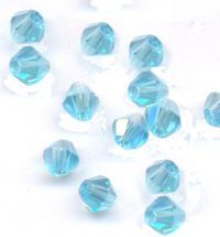 Toupies en crystal 4 mm
Aquavioline
X 100 
