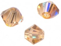 TOUPIES SWAROVSKI® ELEMENTS
 6 mm AB
LIGHT PEACH AB
X 20 perles