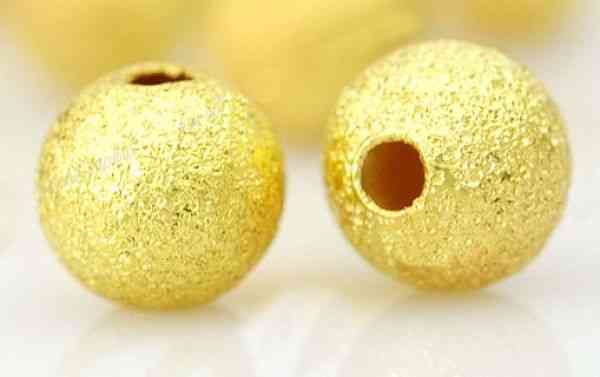 Perles boules Scintillantes intercalaires. Doré 4mm 
taille du trou = 0.8 mm
Qte : 10